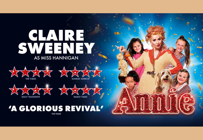 Poster for the event with Claire Sweeney, as Miss Hannigan, surrounded by children and a dog.