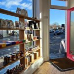 Shelves packed with goods at the Corner Store.