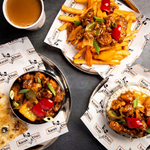 A table full of delicious Indian Street Food.