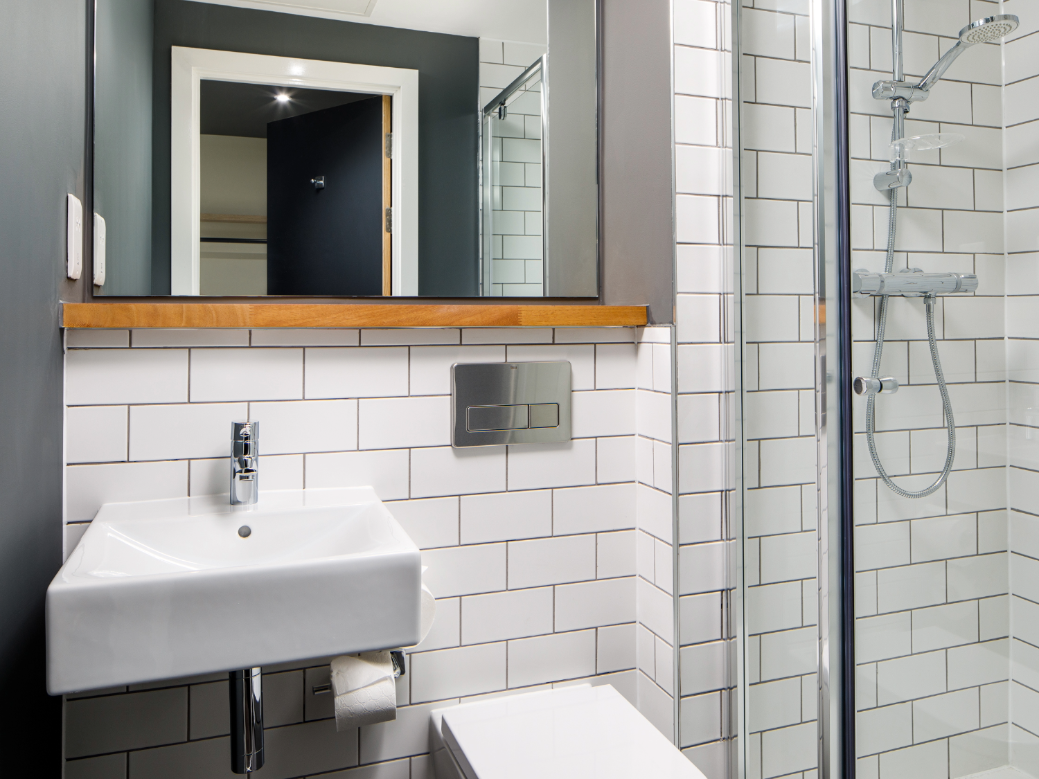 A bathroom with shower at the ibis Budget Sheffield Centre - St Mary's Gate.