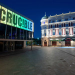 The Crucibleand Lyceum Theatres at night.