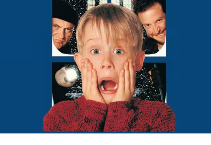 The classic image from the film, with a boy (played by Macaulay Culkin) screaming and holding his hands to his face, while behind him the two villains of the film look in through the window.