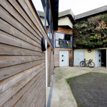 The exterior of Manor Oaks Studios.