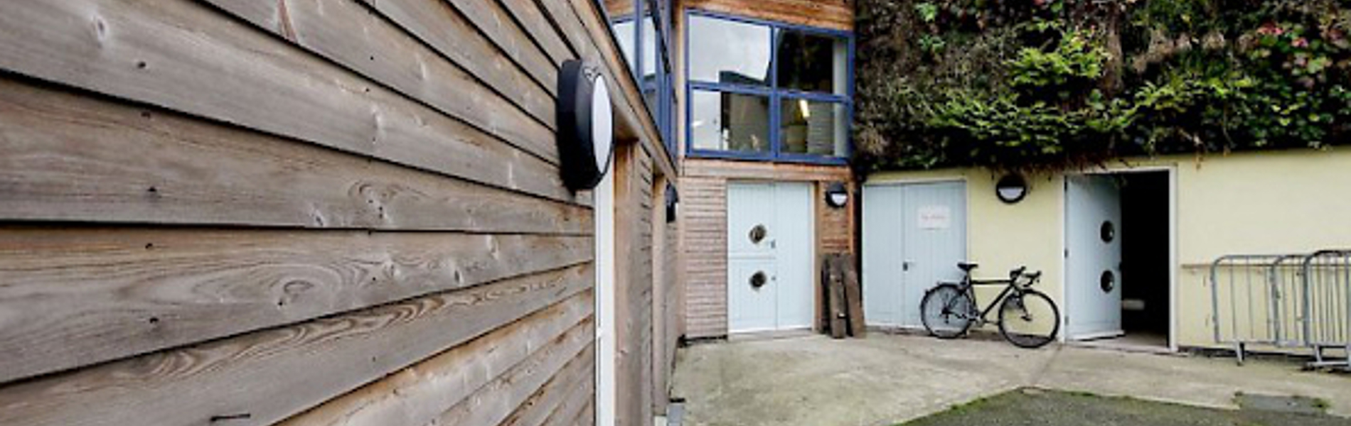 The exterior of Manor Oaks Studios.