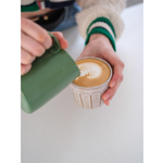 A cappuccino being poured at Kilnfolk Coffee