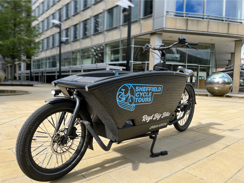 The Sheffield Cycle Tours special bike that has a pod, positioned in front of the rider, where a passenger can sit.