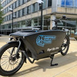 The Sheffield Cycle Tours special bike that has a pod, positioned in front of the rider, where a passenger can sit.