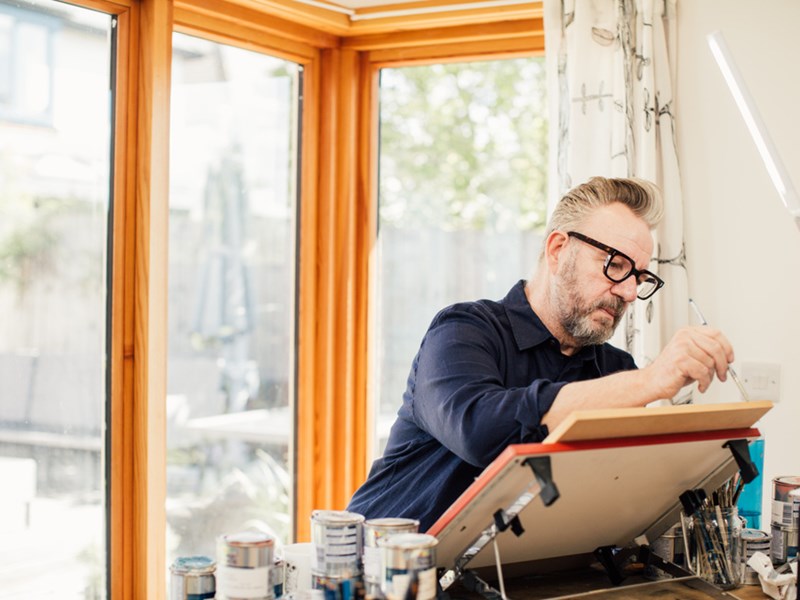 Pete Mckee at work on an easel.