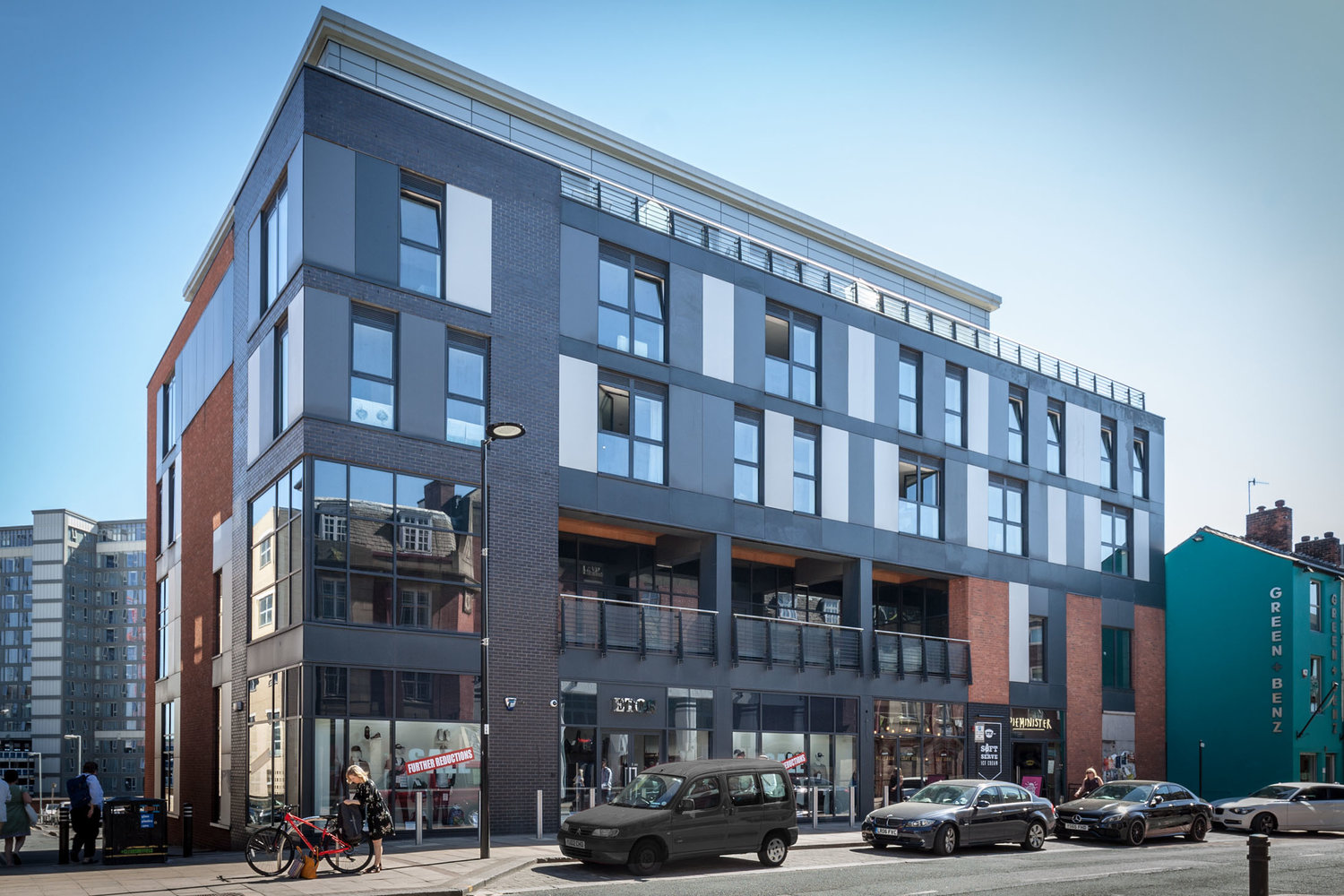 Front of K Space @ The Point and urban backdrop.