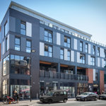 Front of K Space @ The Point and urban backdrop.