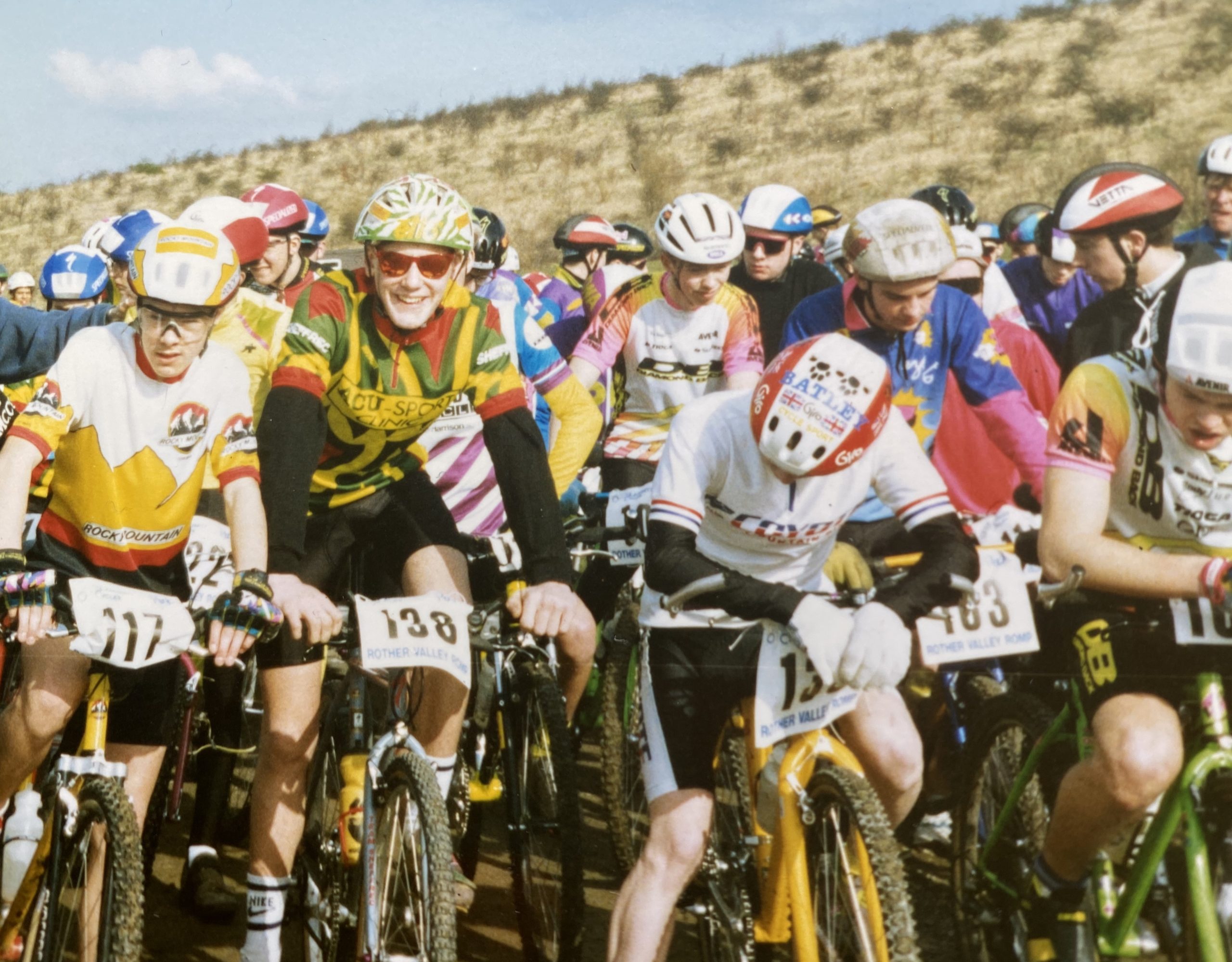 A group of people on a bike race.