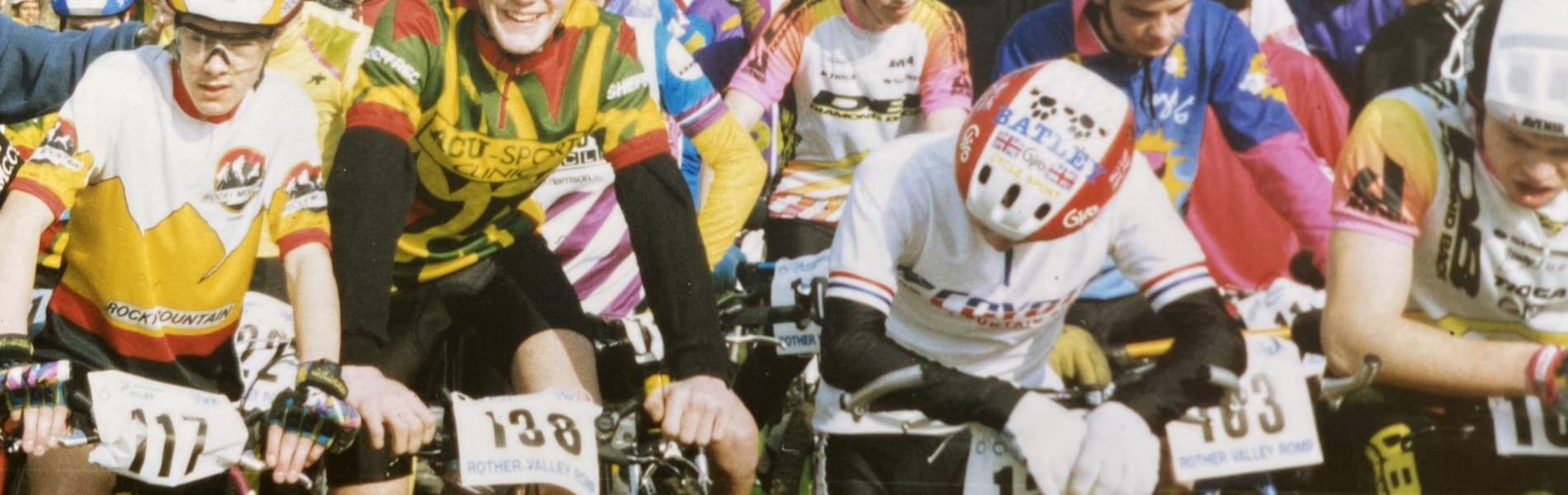 A group of people on a bike race.