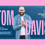 Promo poster for the Tom Davis - Underdog show, with all the event details listed and a picture of Tom Davis, laughing.