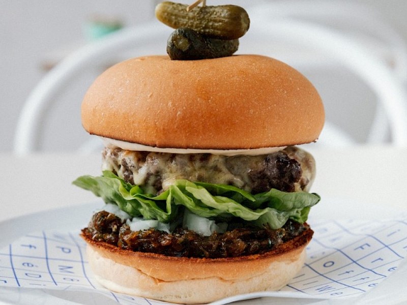 A burger on a plate.