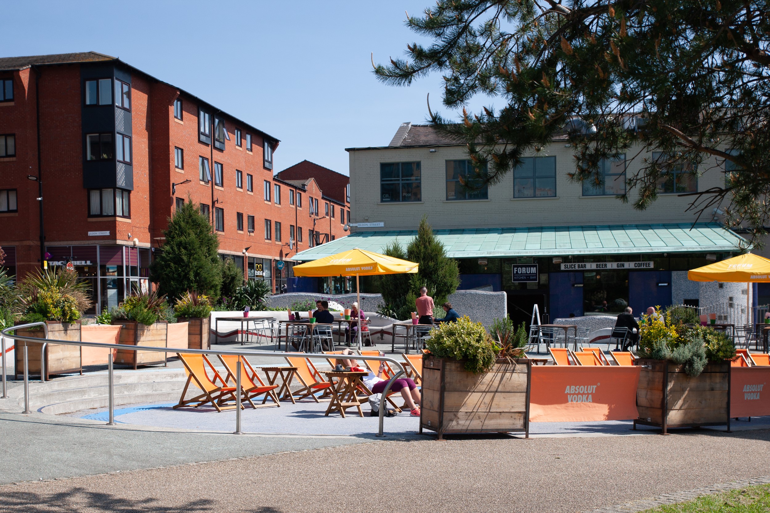 Seating area outside the Forum Kitchen + Bar.
