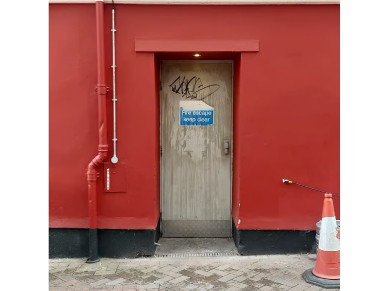 The entrance to Not Open; Don't Come.