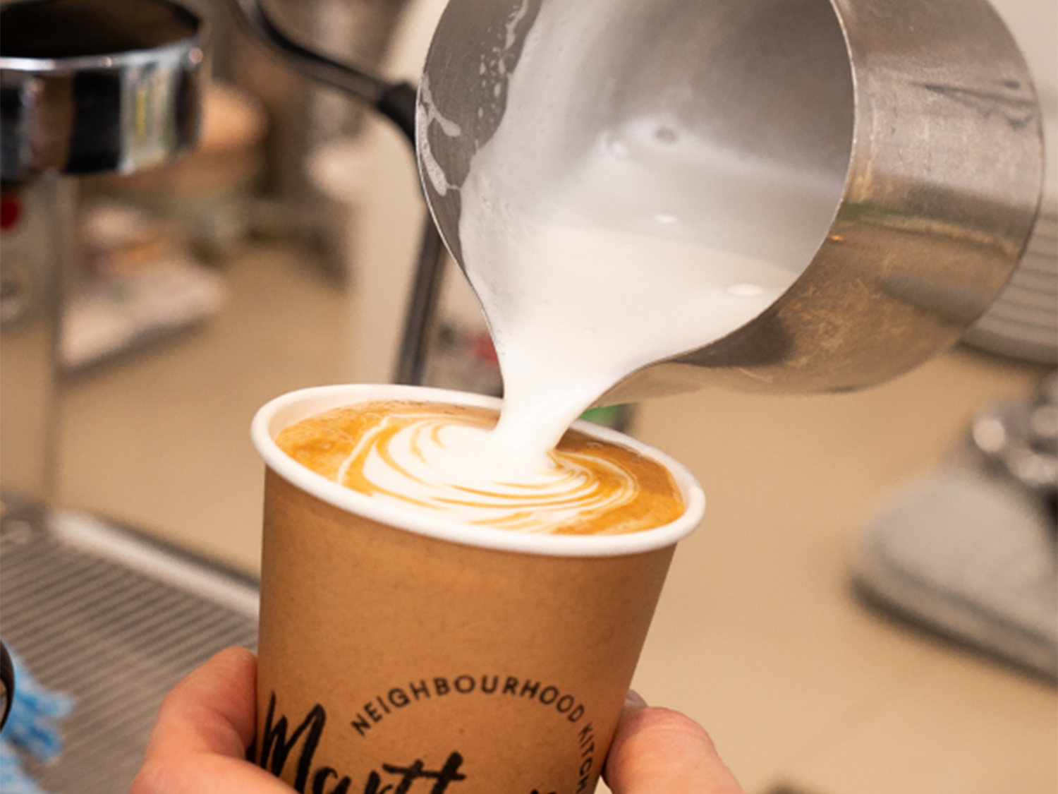 a cappuccino being made. 