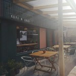 Tables set up outside at Kopi & Chai.