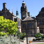 Sheffield Town Hall as seen from The Peace Gardens on a sunny day.