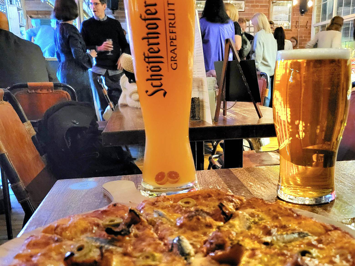 Pizza and grapefruit cider at Perch Brewhouse