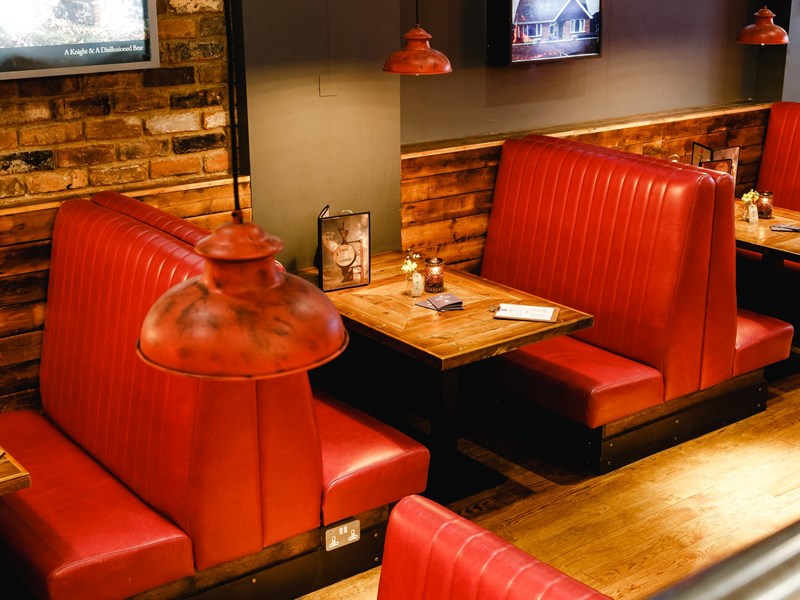 A row of booths at Bungalows & Bears.
