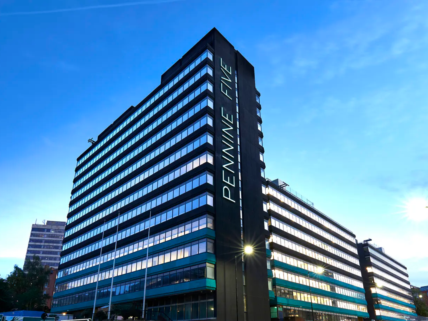 A tall, modern office block.