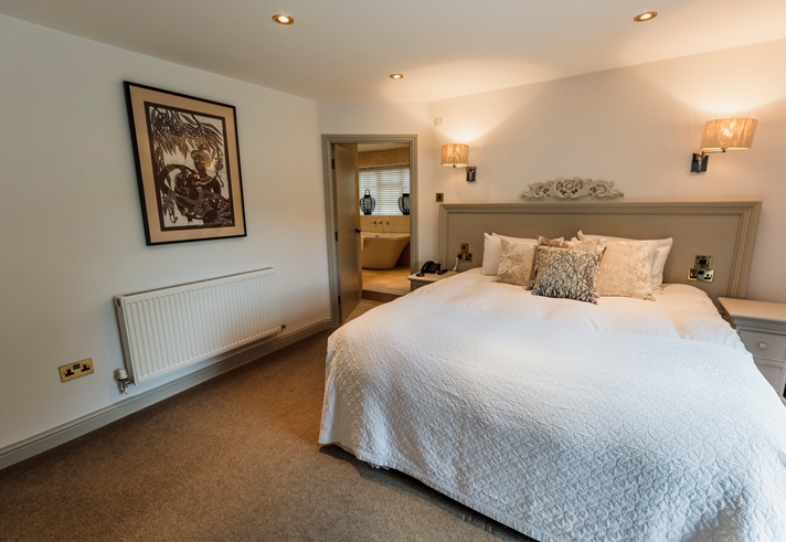 Spacious double room at Losehill Hall Hotel with a comfortable double bed and elegant décor.