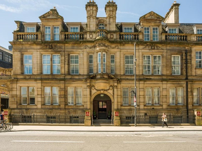 The Gothic stone exterior of the Leopold Hotel in the centre of Sheffield.