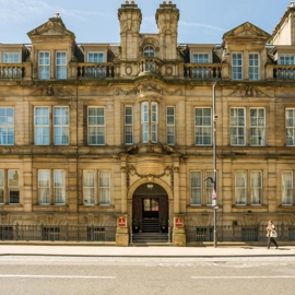 The Gothic stone exterior of the Leopold Hotel in the centre of Sheffield. 