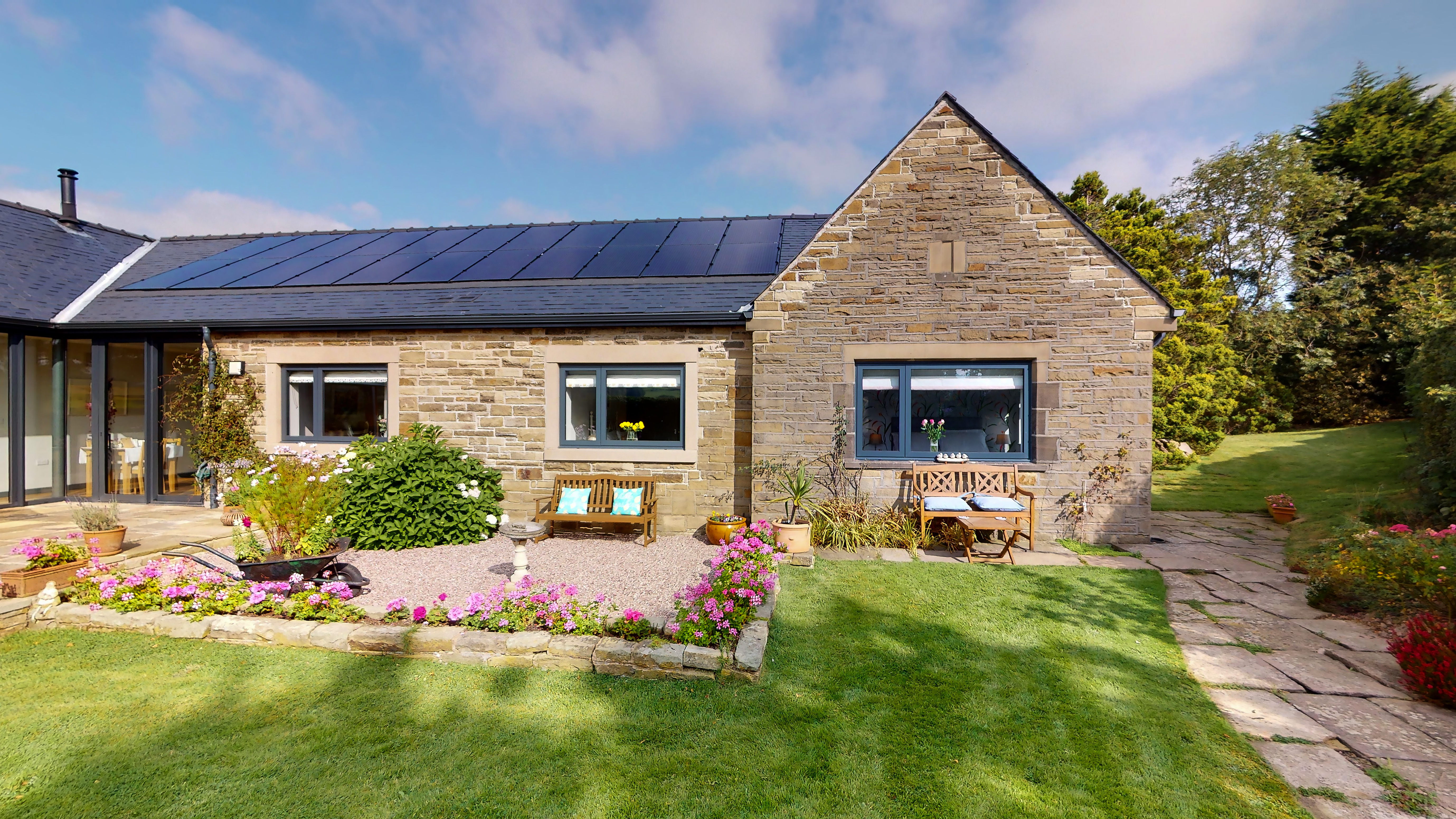 Exterior view of Finkle Green Bed and Breakfast with entrance and surrounding greenery