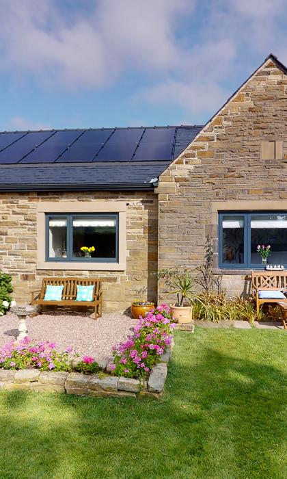 Exterior view of Finkle Green Bed and Breakfast with entrance and surrounding greenery