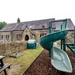 A children's outdoor play area at The Schoolrooms.