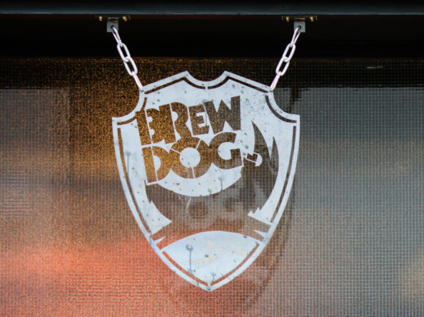 A sign with the BrewDog logo.