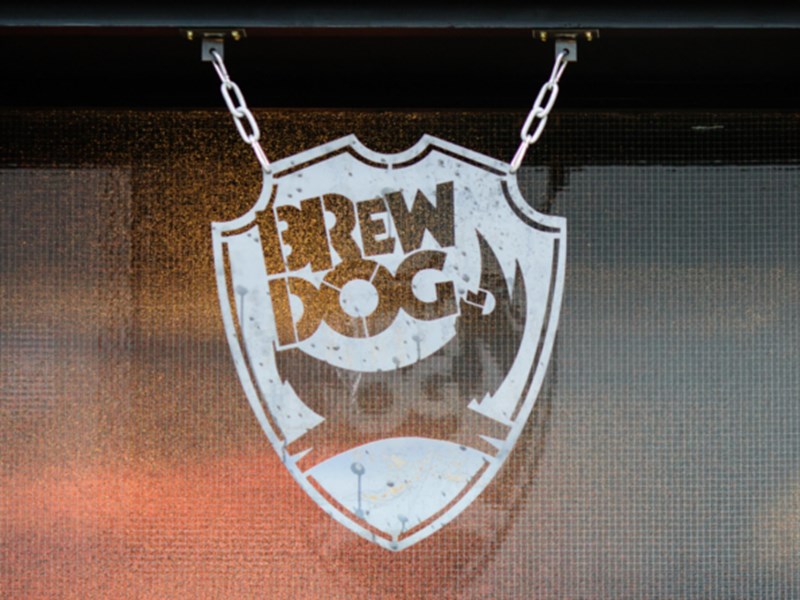 A sign with the BrewDog logo.