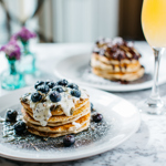 A stack of blueberry pancakes.