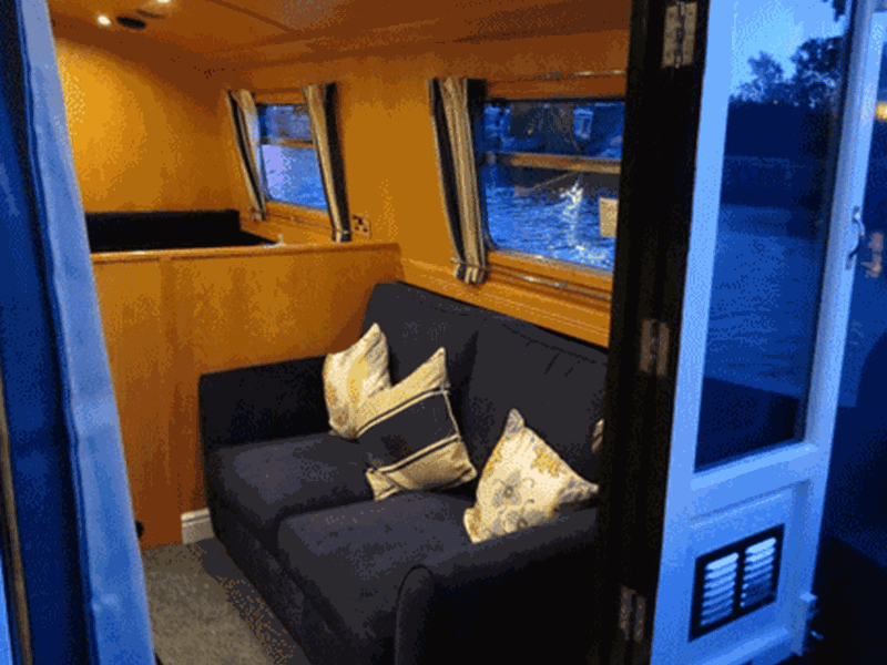Houseboat Hotel – soft furnishings including cushions and seating.
