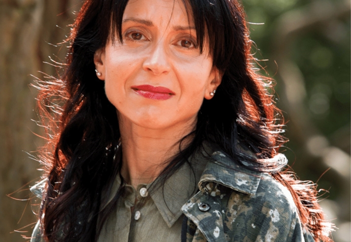 A head and shoulders portrait of Nina Bhadreshwar.