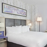 Bedroom featuring one double bed with modern furnishings.