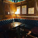 A cosy corner table at The Millowners Arms.