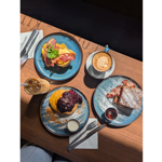  A lovely breakfast, set out on a wooden table in the sunshine, at the Copper Pot Café.