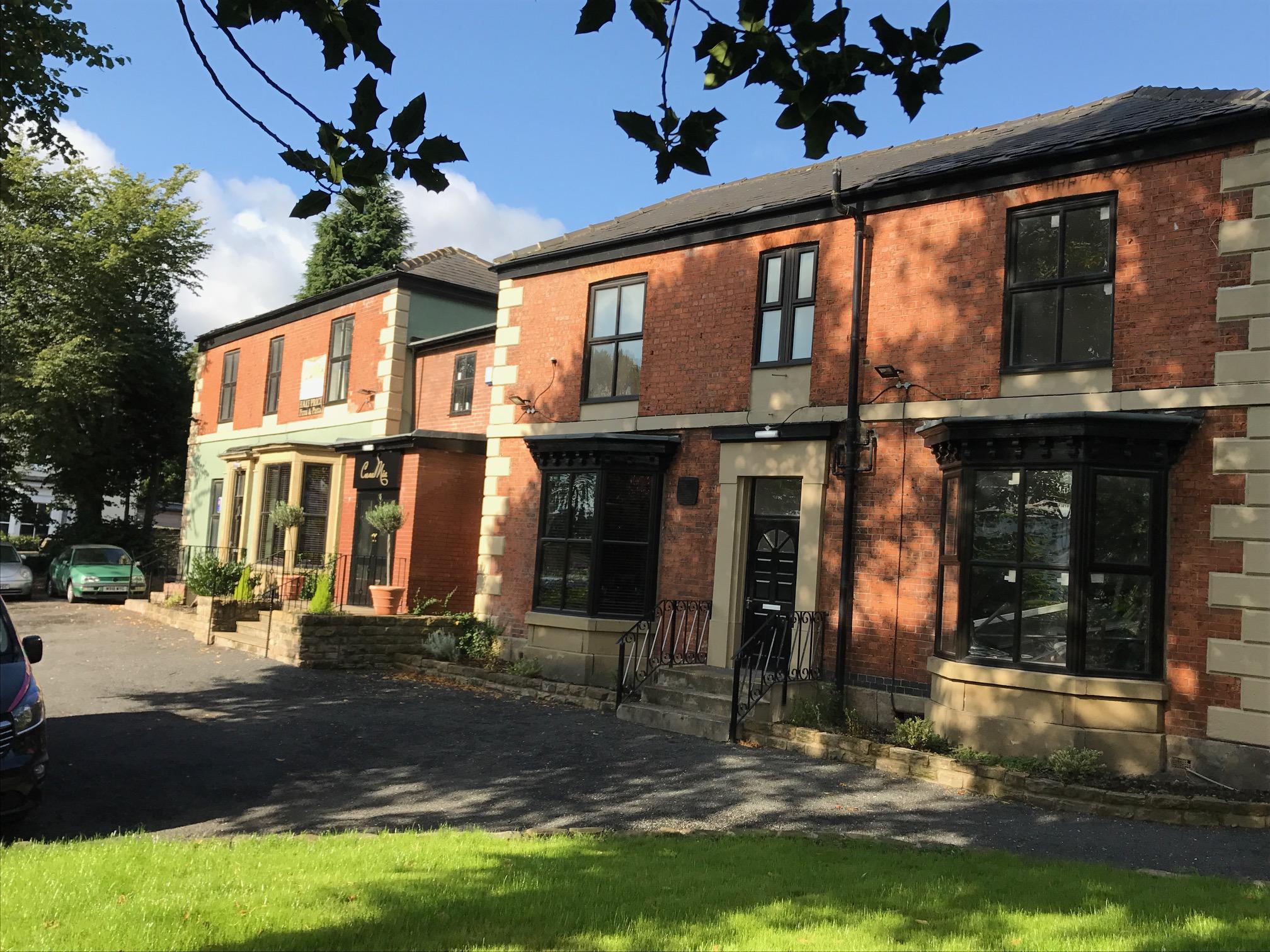 Front view of The Dalbury & Palmer Hotel showing the building and entrance.
