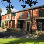 Front view of The Dalbury & Palmer Hotel showing the building and entrance.