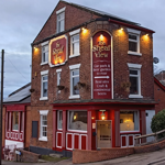 Exterior of the Sheaf View at dusk.
