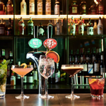 Several cocktails lined up on the bar at The Light Cinema.