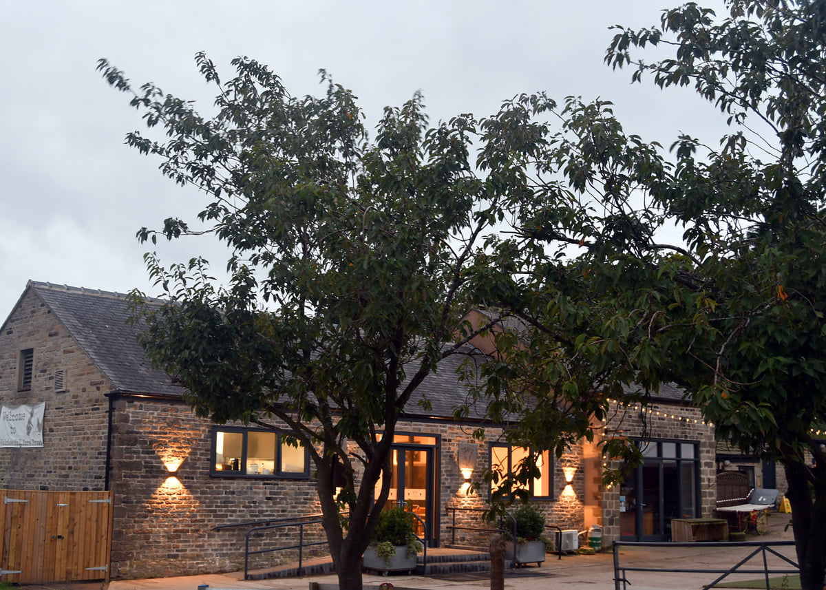 Farm buildings at dusk at Whirlow Hall Farm.