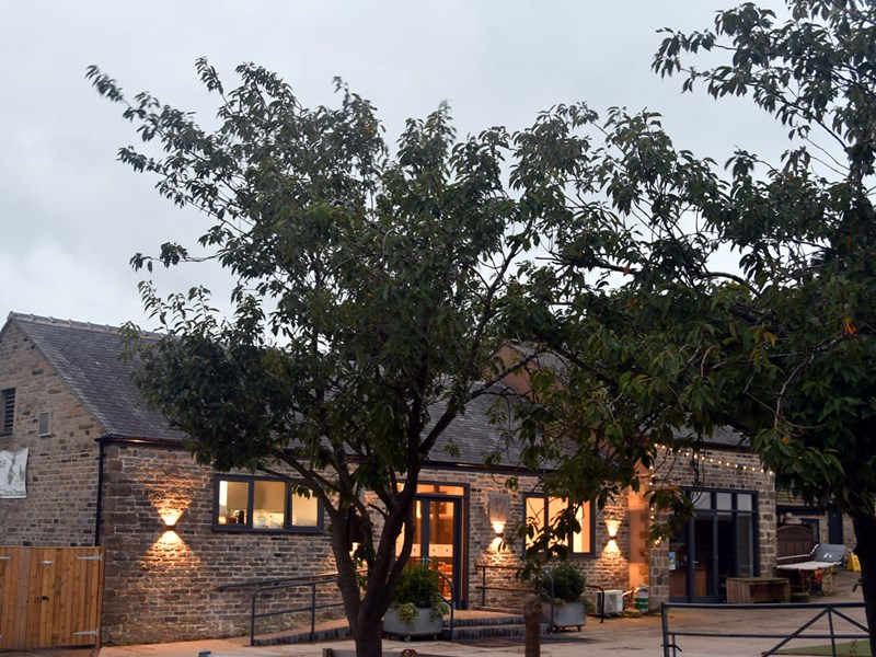 Farm buildings at dusk at Whirlow Hall Farm.