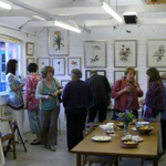 People looking at an art exhibition.