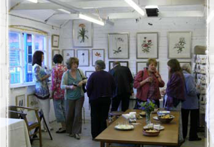 People looking at an art exhibition.