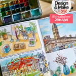 A book with paintings and a set of watercolours on a table.