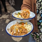 A close up of two plates of food.
